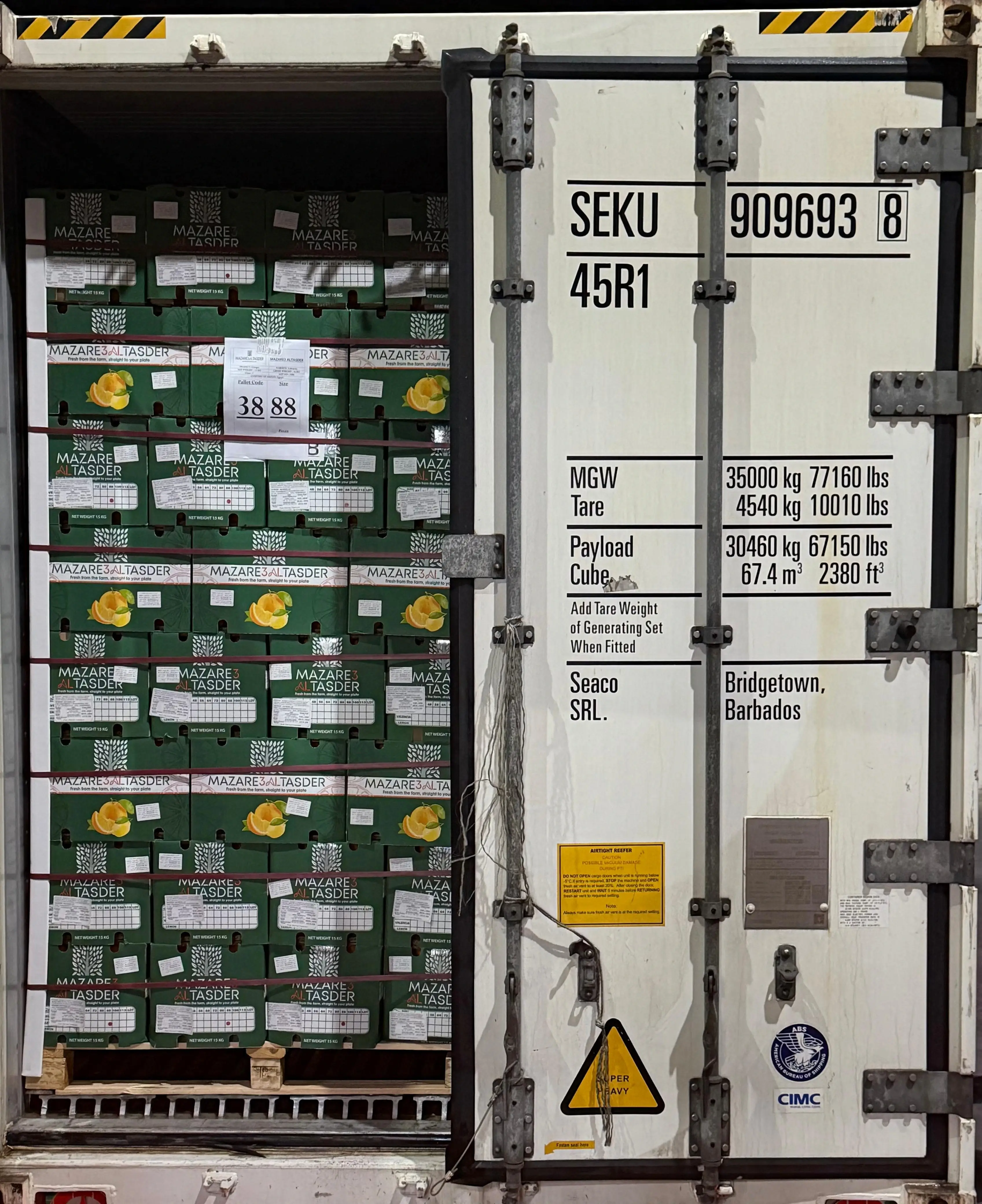Shipping container loaded with pallets